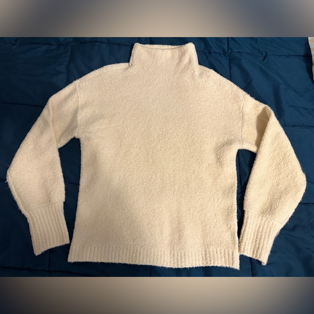 Women’s sweater with high neck